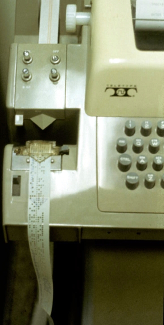 An ASR33 terminal showing the Papertape Punch