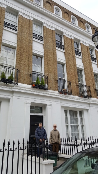 Image of Charles Norrie and I outside George Julius' house in Islington